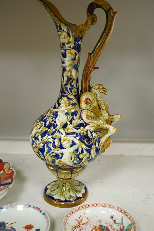 Eight Chinese 18th and 19th century plates and dishes, together with a painted botanical plate and a Cantagalli maiolica ewer, tallest ewer 37cm high. Condition - ewer and a small dish restored, the other items good